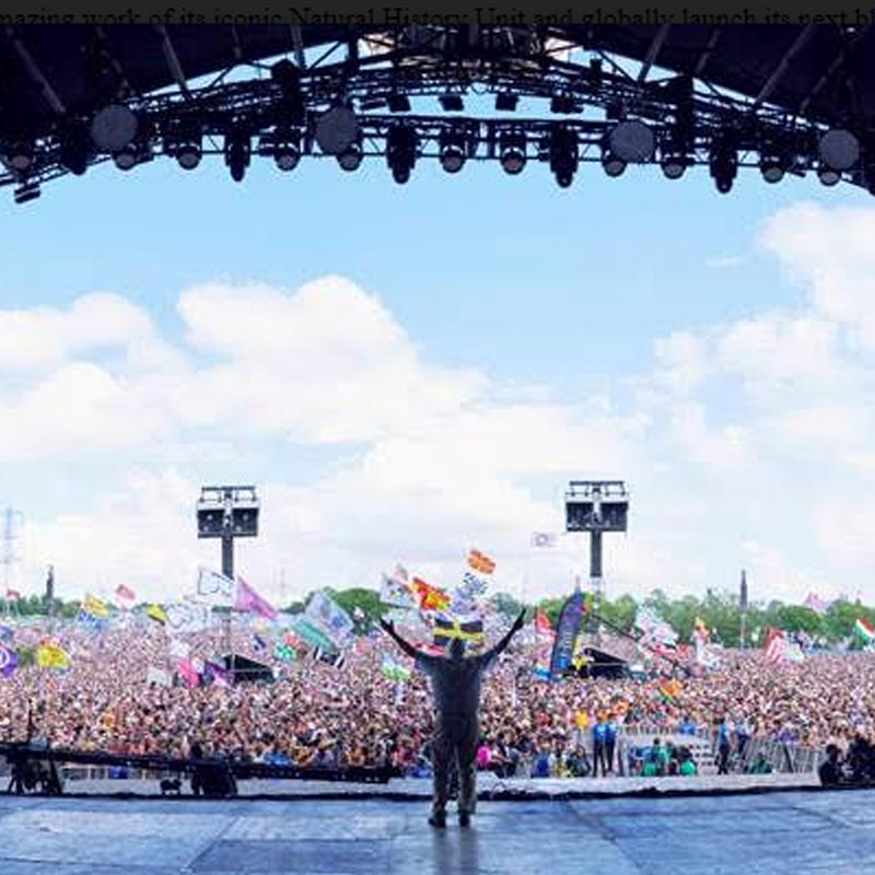 Sir David Attenborough makes surprise onstage appearance at glastonbury to launch new BBC natural history series seven worlds, one planet